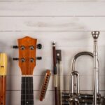 musical instruments in white wooden background